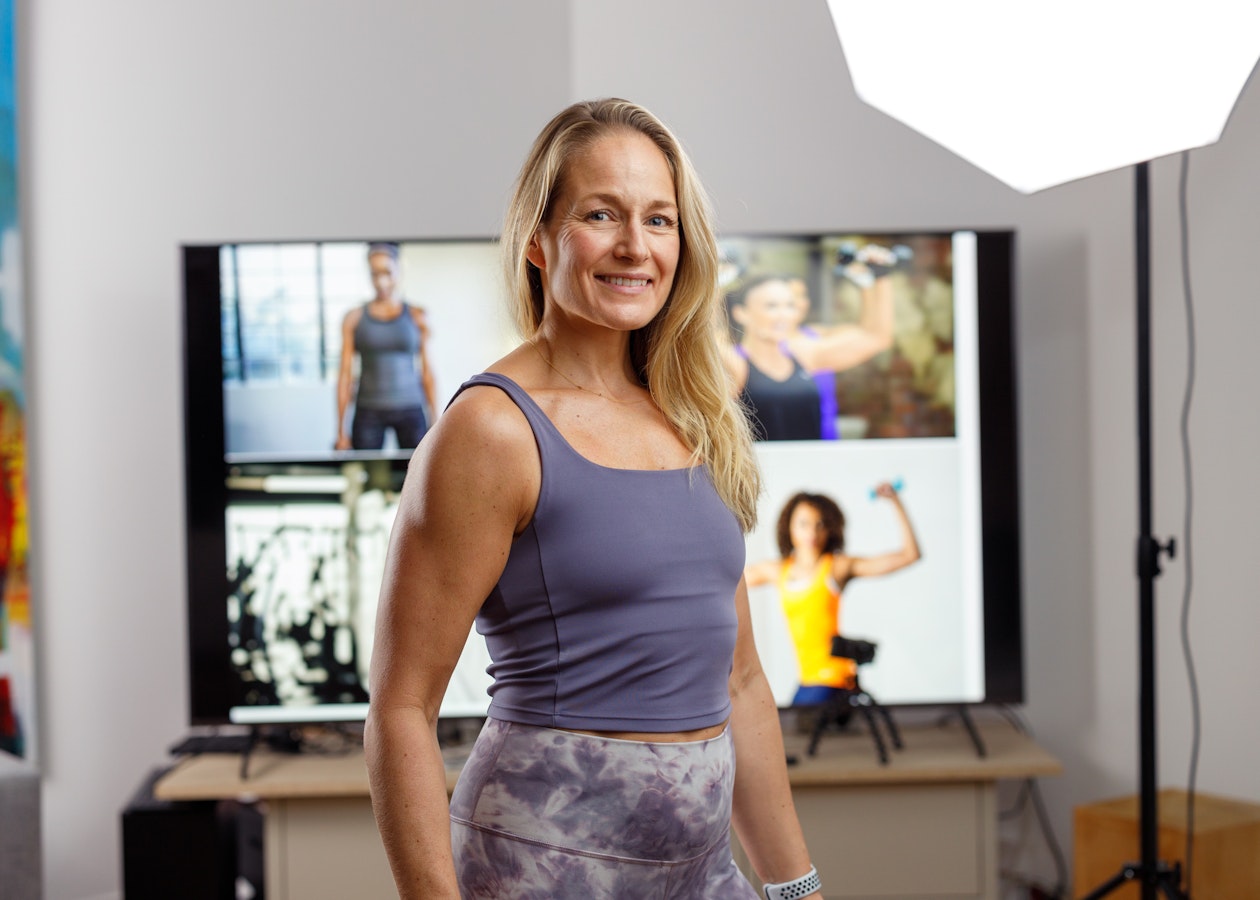 Professional fitness instructor demonstrating the platform